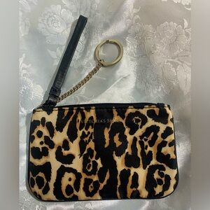 Victoria's Secret leopard print coin purse with a key ring and wristlet strap.